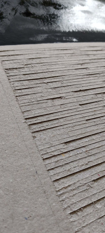 Check the black linoleum drying and closeup Minimalistic cardboard art